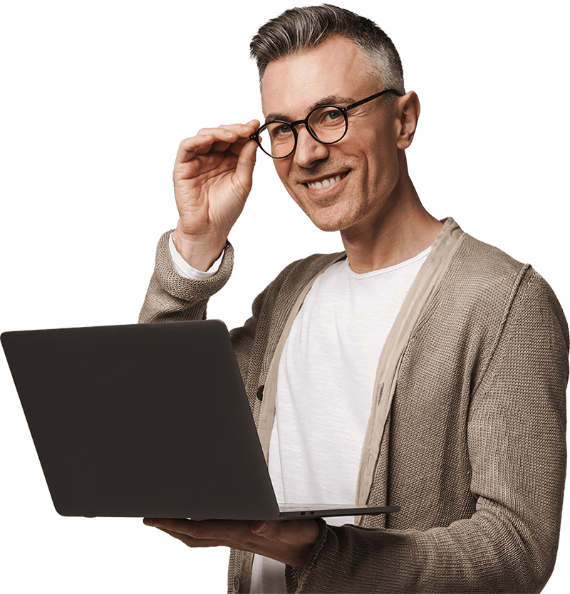 Confident marketing operator standing with a laptop